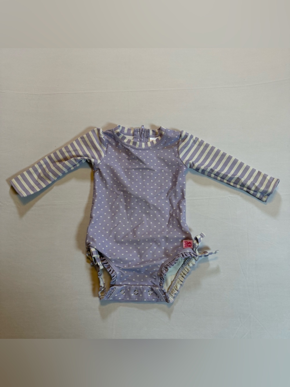 RuffleButts Girls Purple Heart Long Sleeve One Piece Swimsuit 12-18M